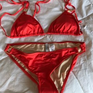 Tibi Orange bikini in a size medium